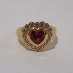 Verona Signet Ring laid flat showing polished gold finish