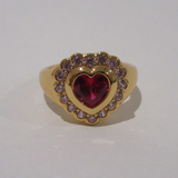 Verona Signet Ring laid flat showing polished gold finish