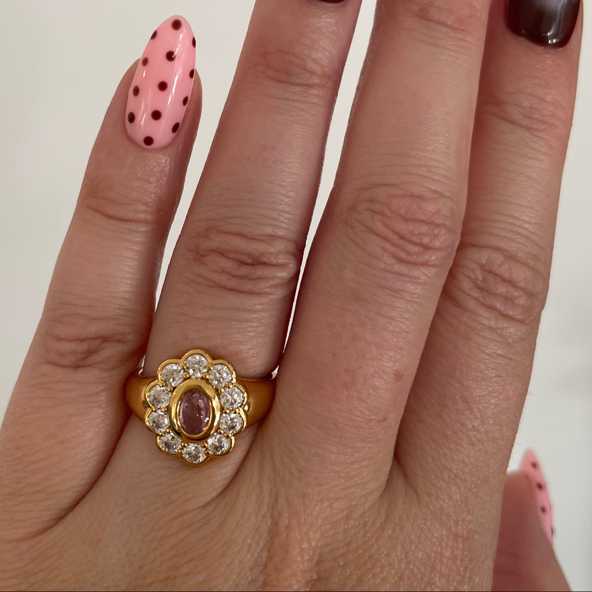Model wearing the Fleur Signet Ring